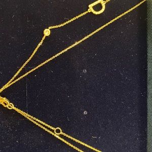 Solid gold and diamond David Von D necklace